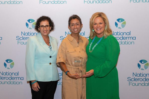 Debbie Chalrton posing for a photo with Mary Wheatley and Dr. Carol Feghali-Bostwick.