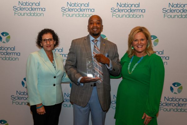 Kelley Hill posing for a photo with Mary Wheatley and Dr. Carol Feghali-Bostwick.