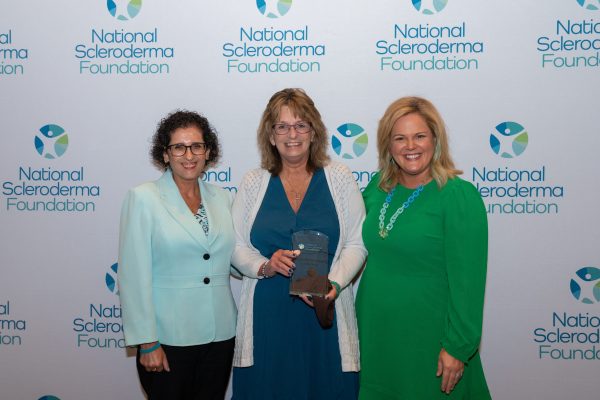 Peggy Collins posing for a photo with Mary Wheatley and Dr. Carol Feghali-Bostwick.